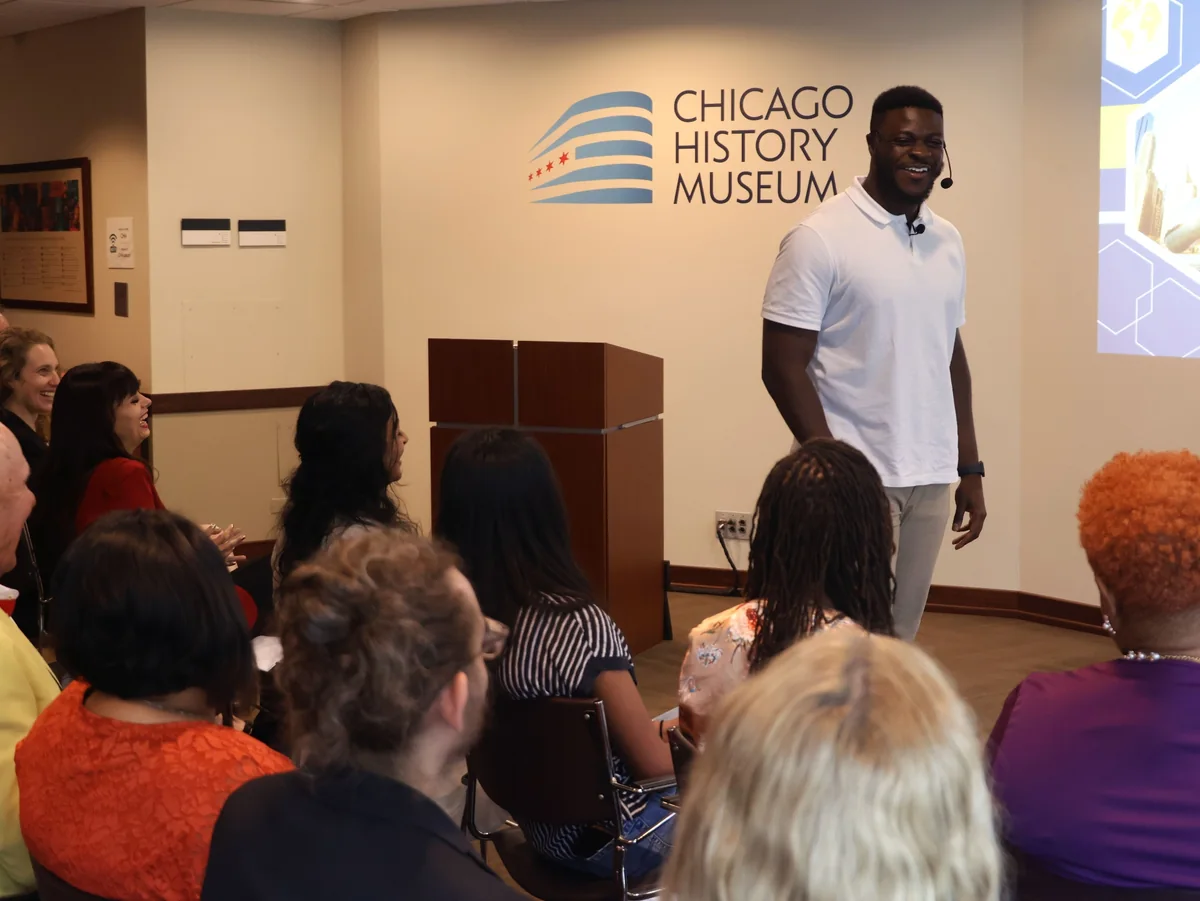 Caleb Duah speaking on stage